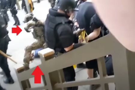 National guard members assist bleeding 75 year old man who was pushed by police.